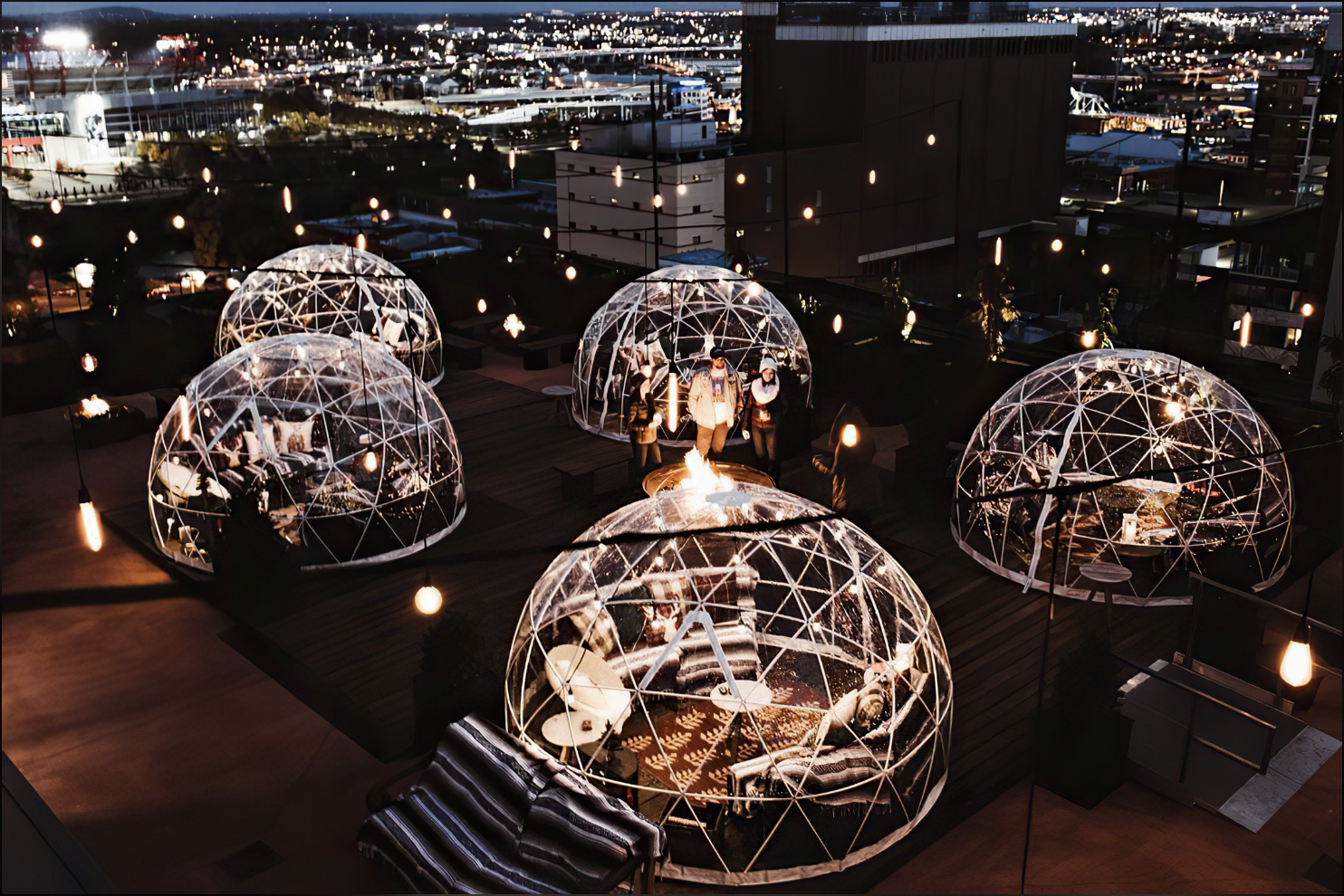 clear plastic igloos on a rooftop