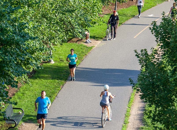 people exercising on a trail